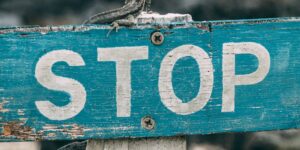 selective focus photography of stop road sign